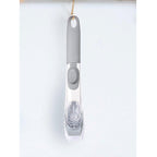 Liquid dispensing dish brush